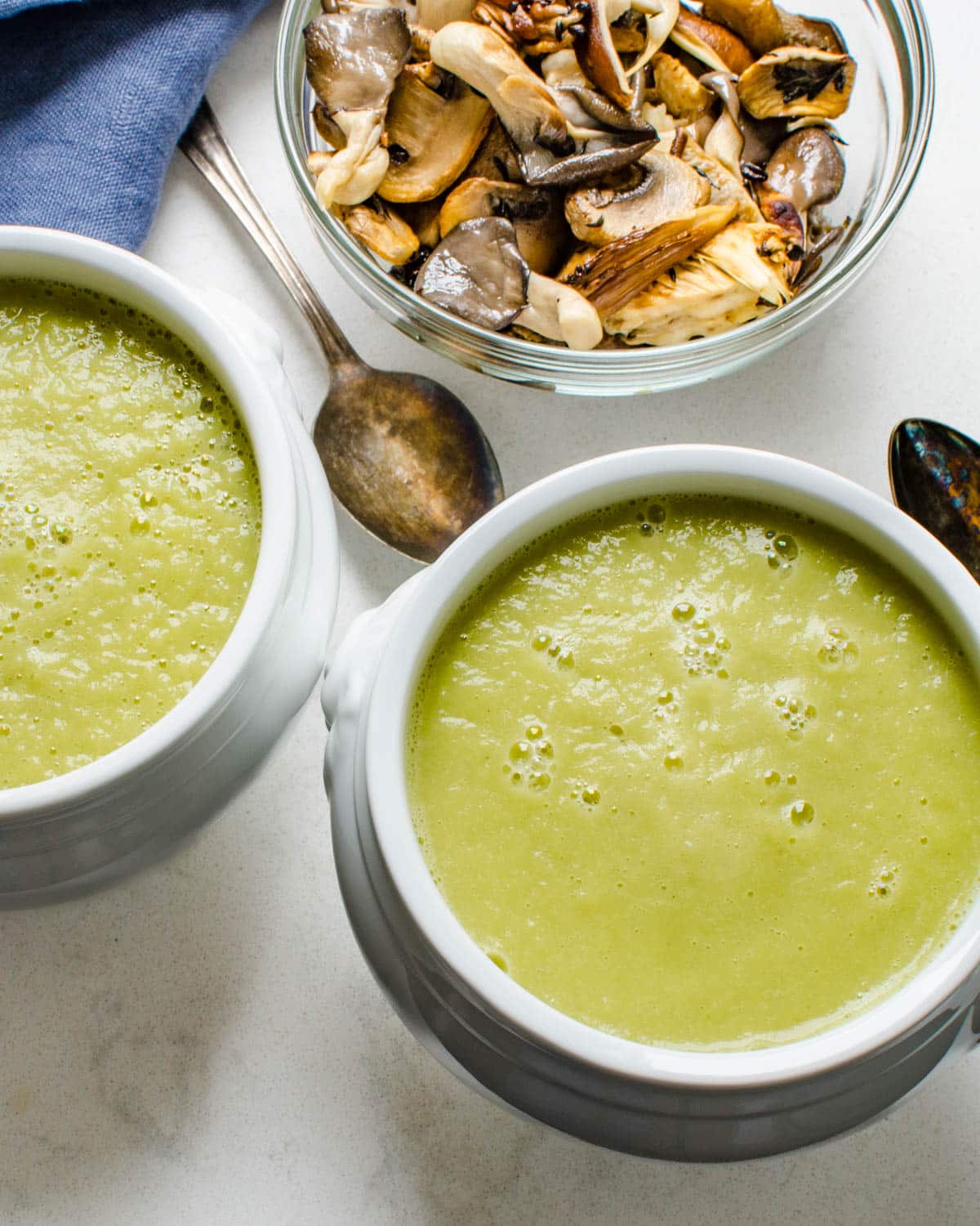 Ladling the creamy leek and fennel soup into bowls.