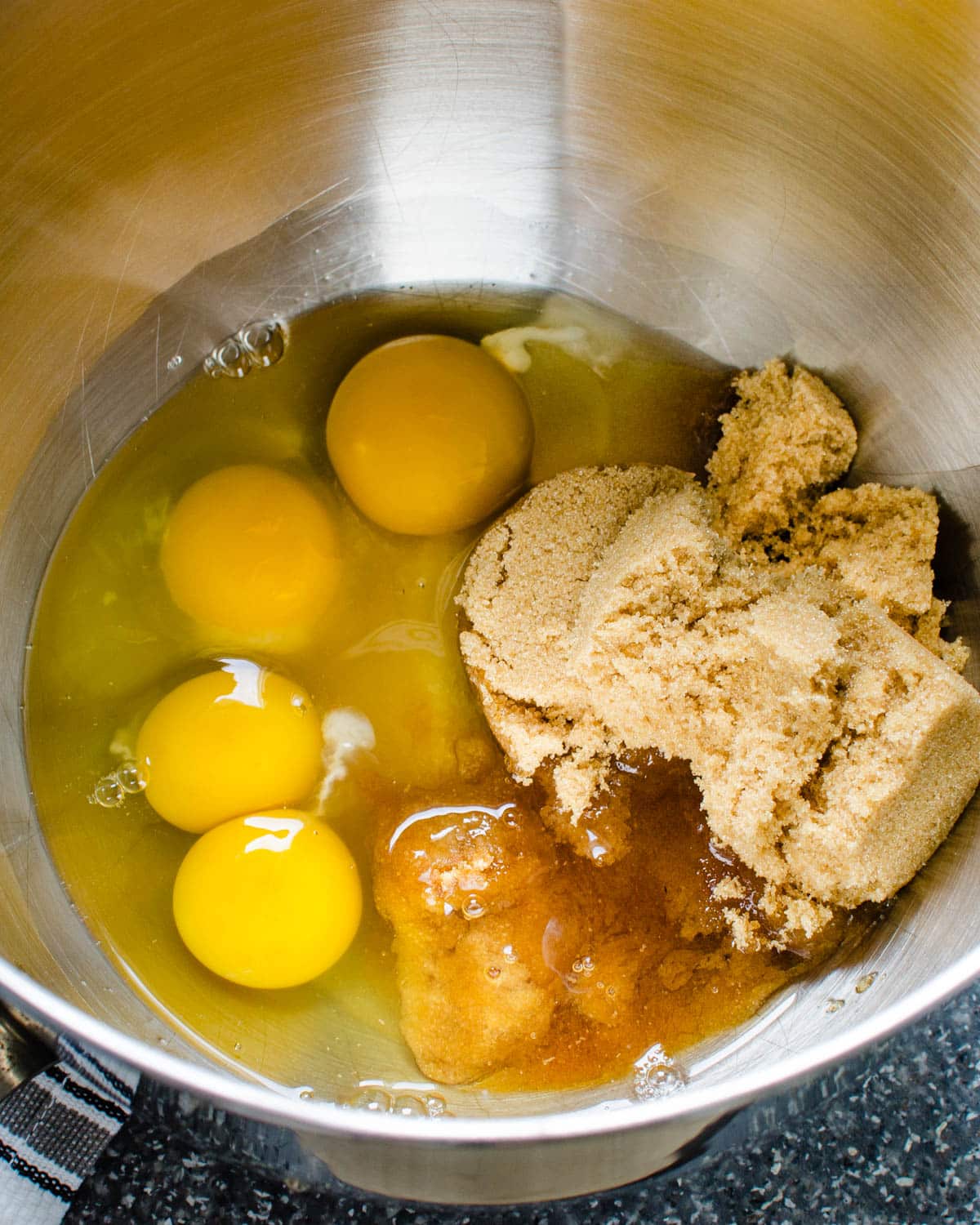 Combining the eggs and brown sugar. 