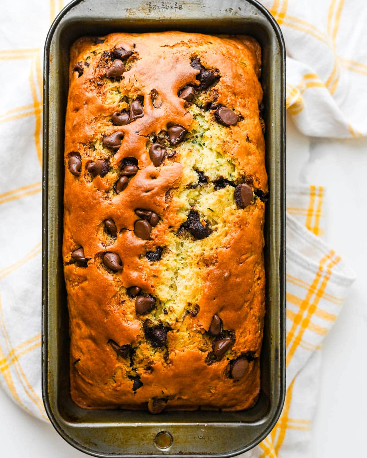 A baked loaf of the chocolate chip zucchini bread.