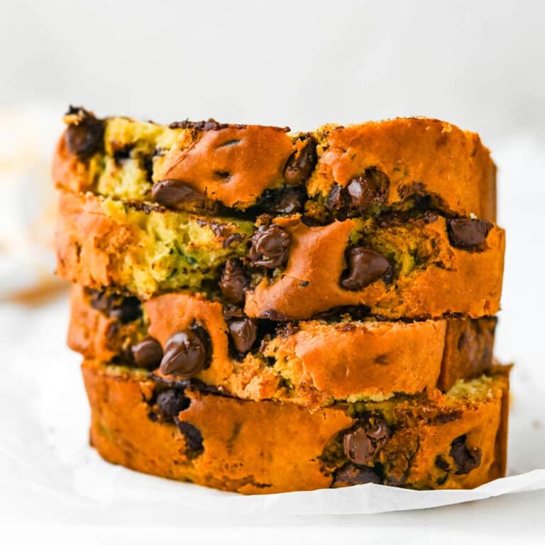 A stack of sliced chocolate chip zucchini bread.