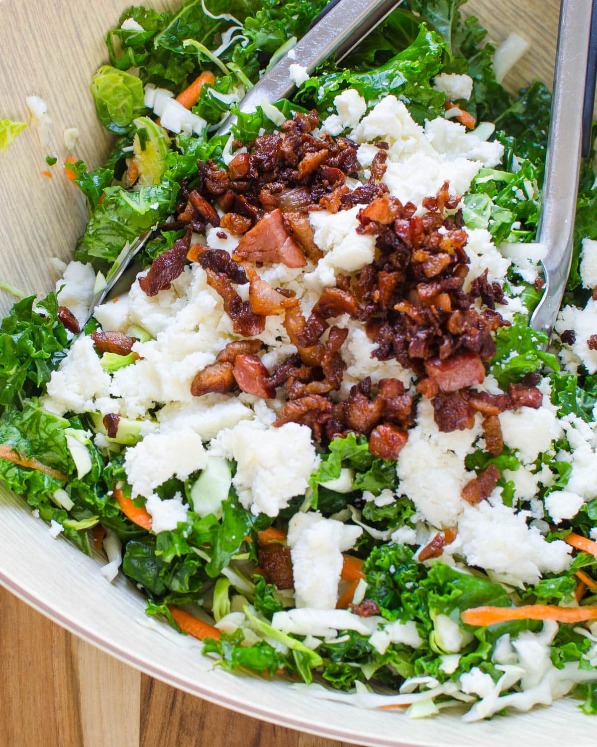 tossing in crumbled cheese and pancetta with the salad ingredients. 