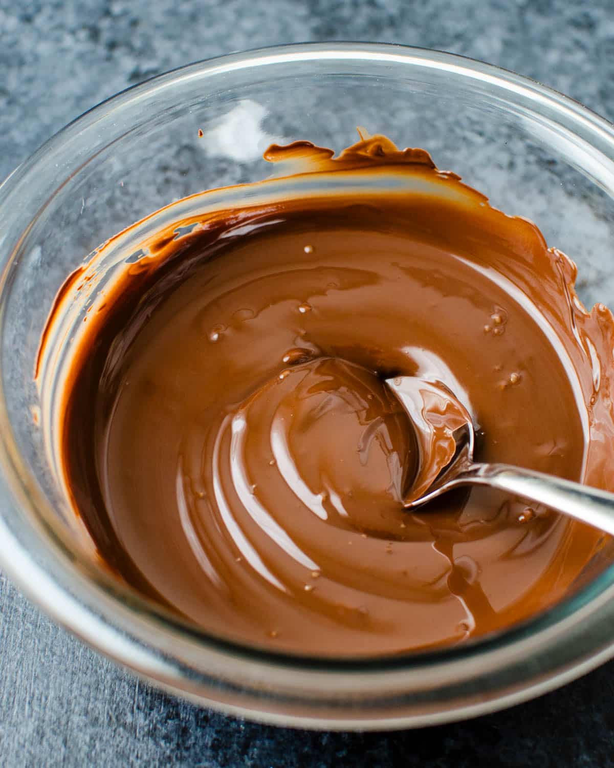 Melting dark chocolate in a bowl.