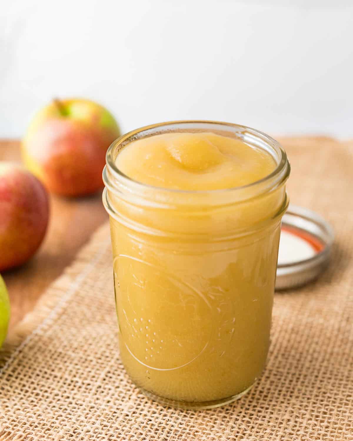 a canning jar of applesauce.