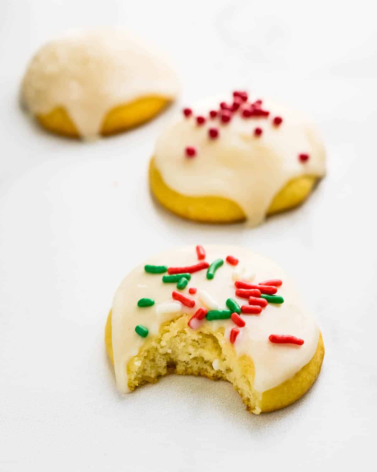 Taking a bite of the soft ricotta cookies.