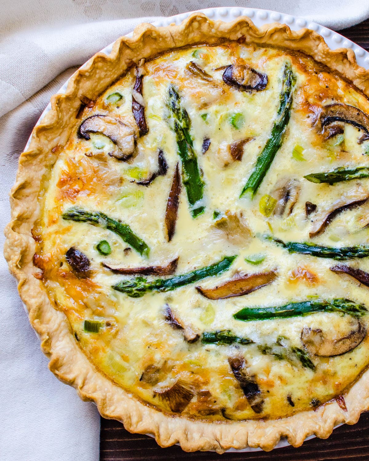 Baked asparagus quiche cooling.