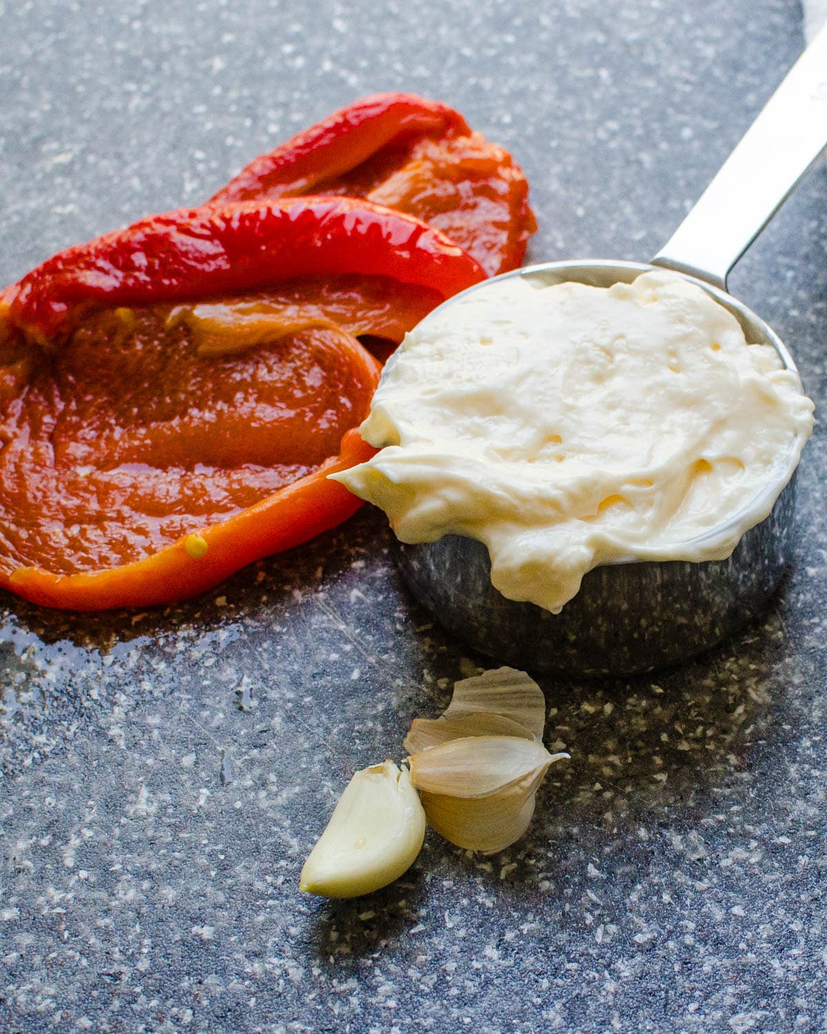 roasted red peppers with mayo and garlic.