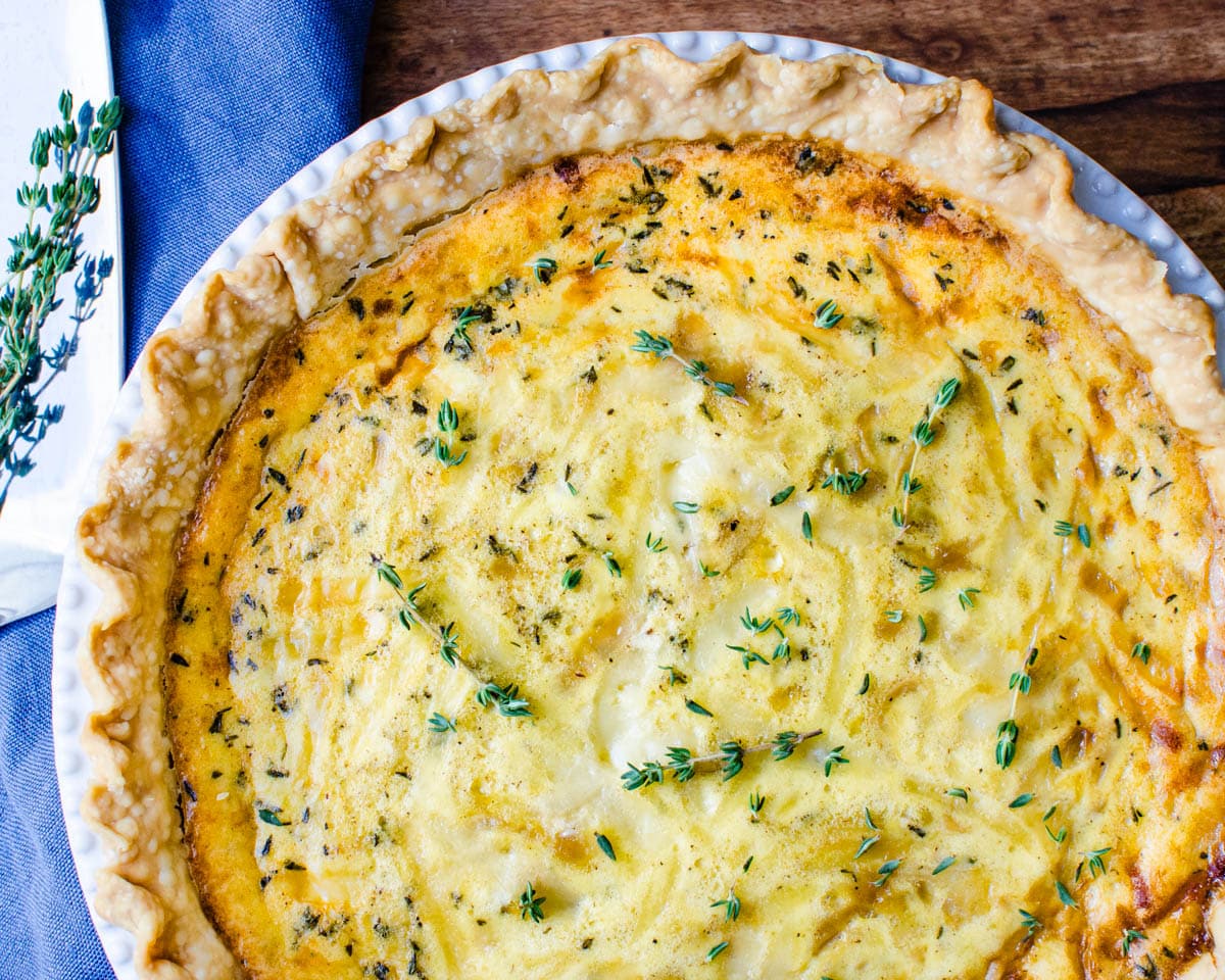 Baked caramelized onion quiche ready to serve. 