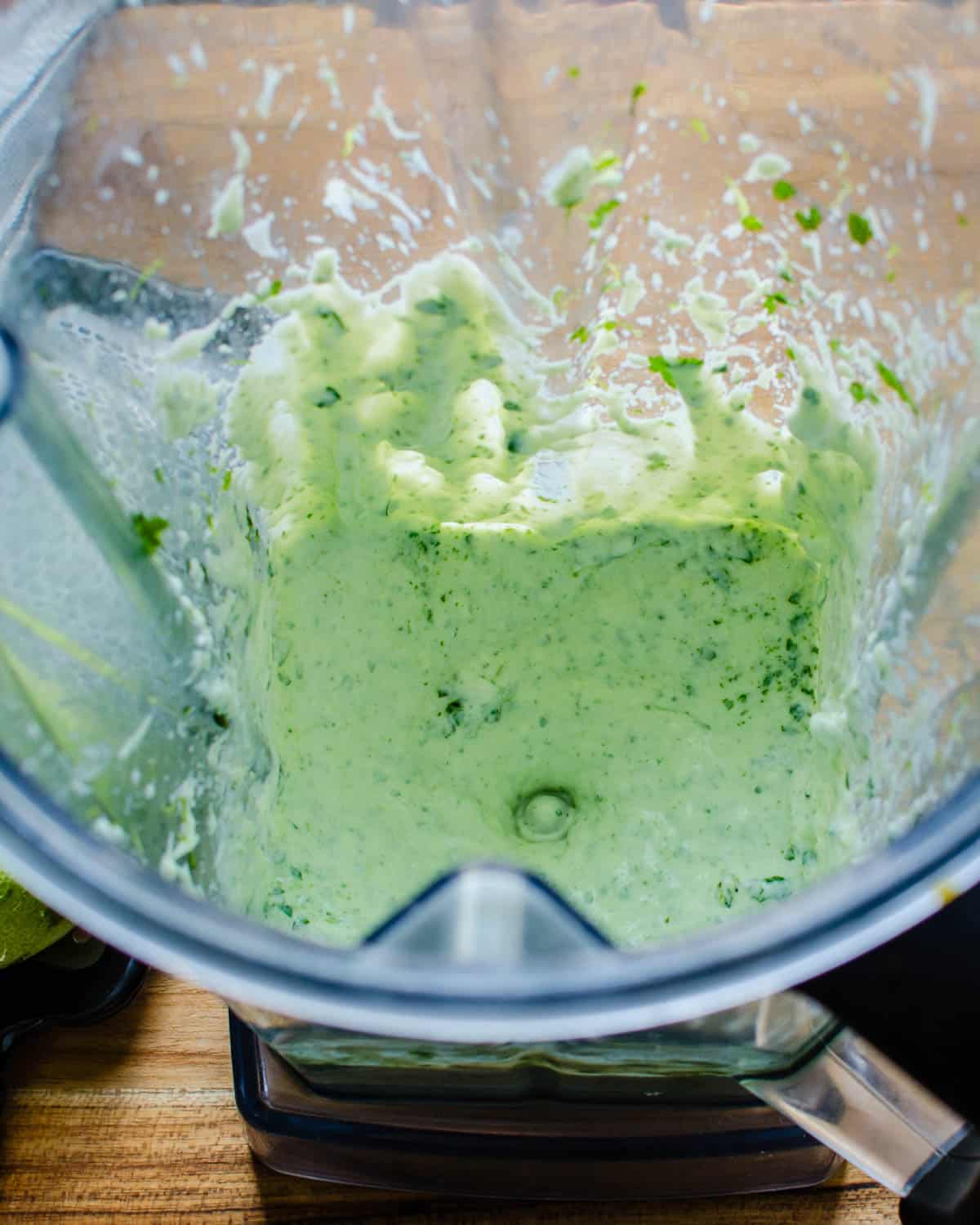 assembling the lime crema in a blender. 