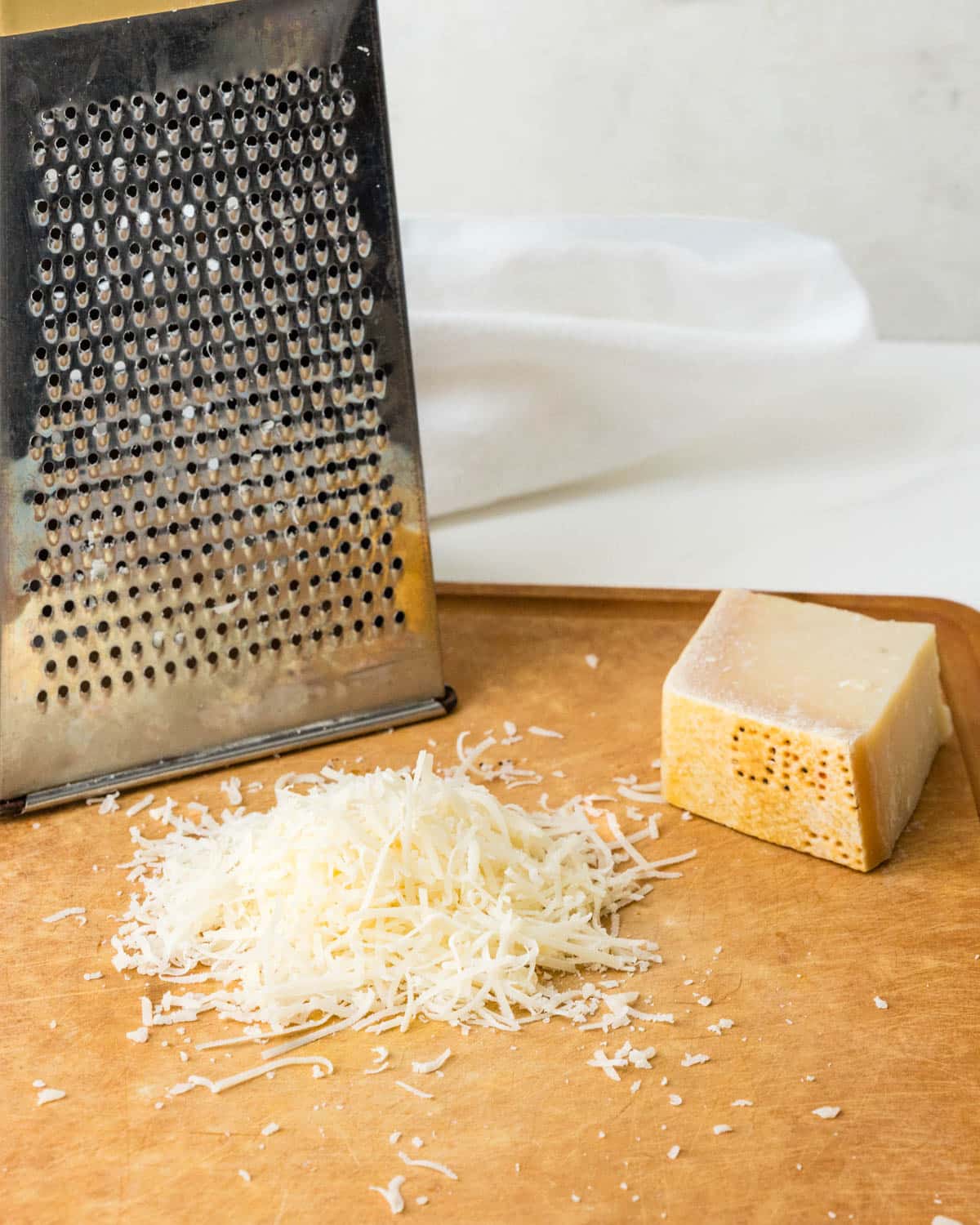 Grating parmesan cheese. 