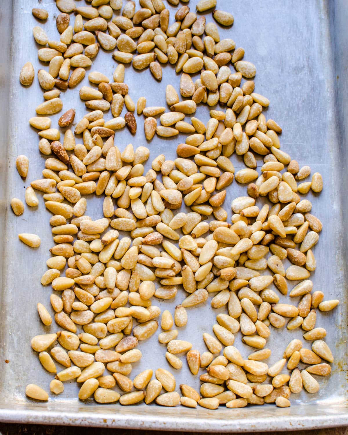 I am toasting Pine Nuts on a sheet pan.