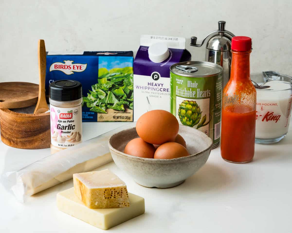 Ingredients for spinach artichoke quiche.