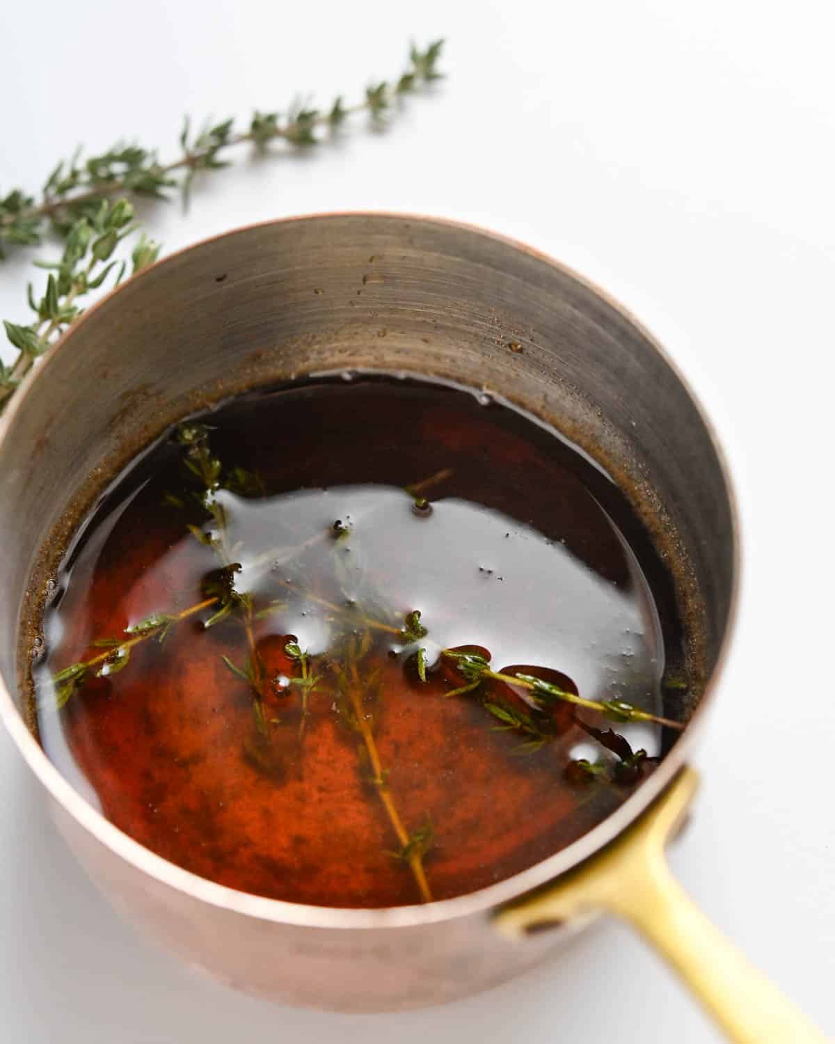 Making the thyme-infused simple syrup.