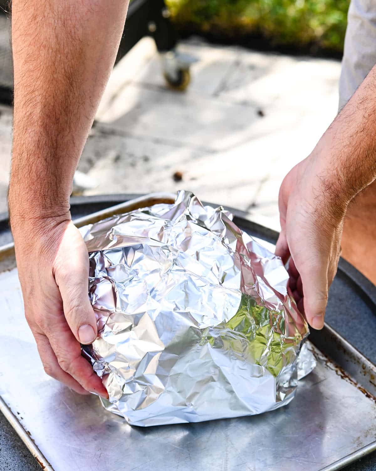 wrapping the meat in heavy duty foil.