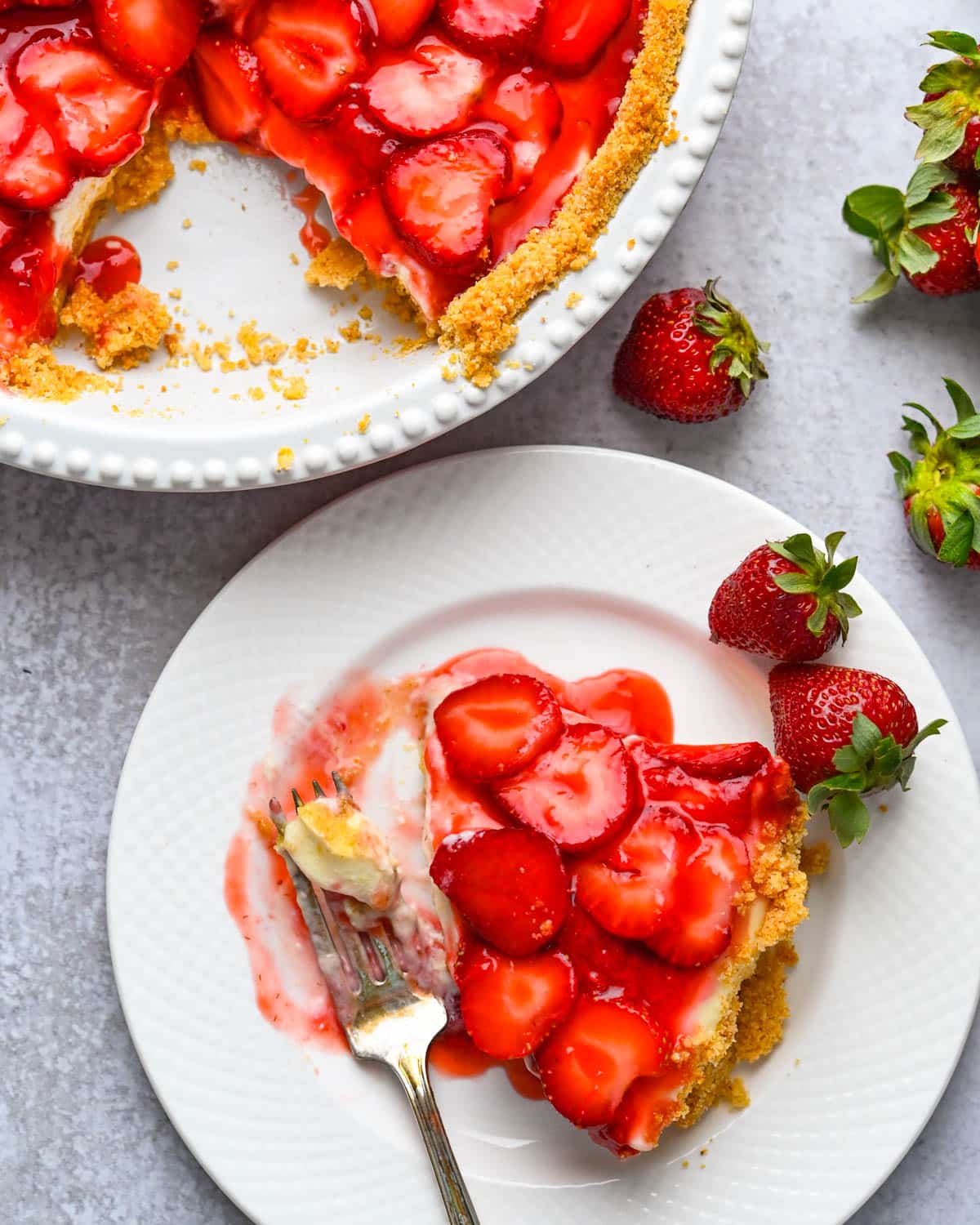 A piece of the strawberry ricotta pie on a plate.
