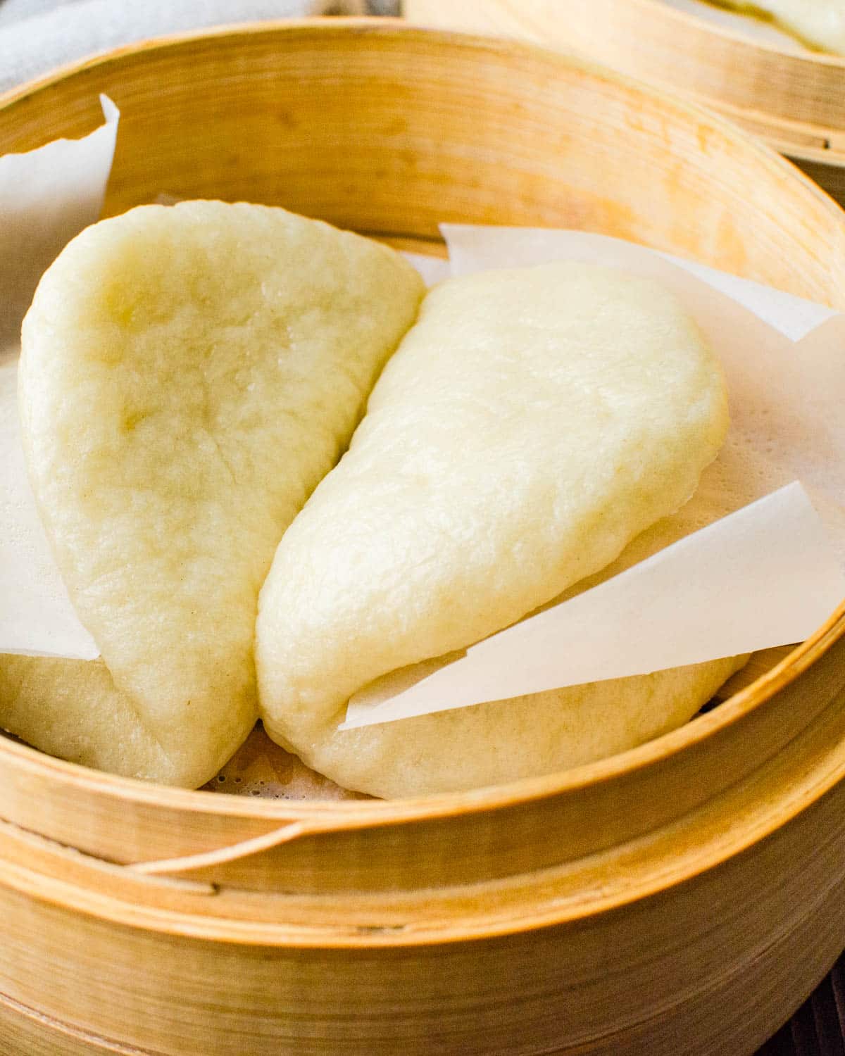 The steamed bao buns are fluffy and light.