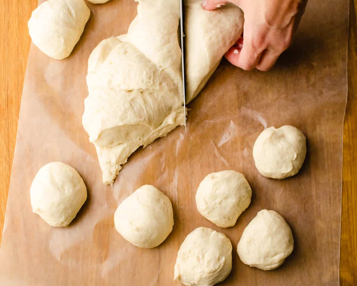 Dividing the dough into buns.