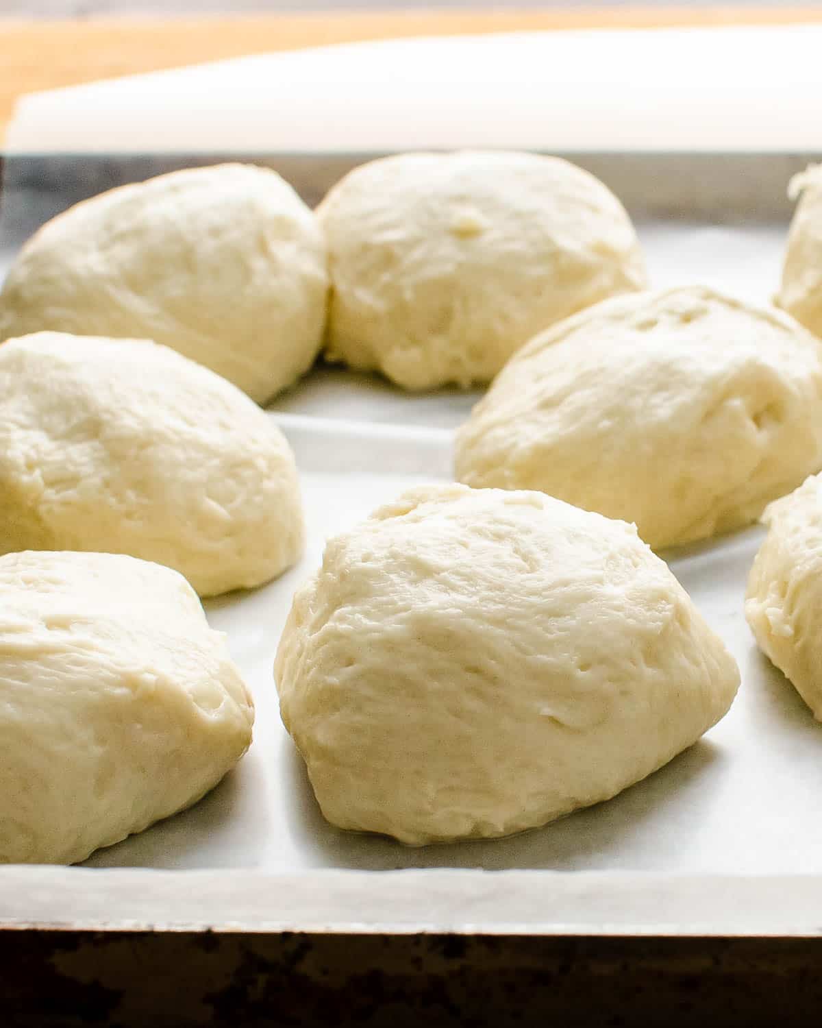 Transfer the dough balls to a baking sheet.