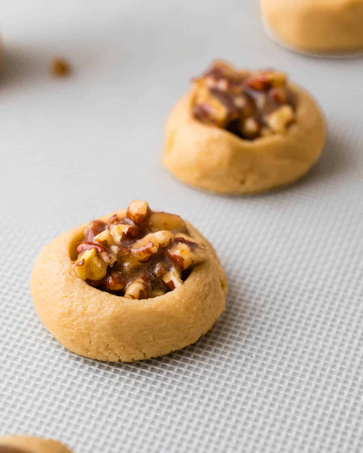 The filled pecan pie cookies ready to bake. 
