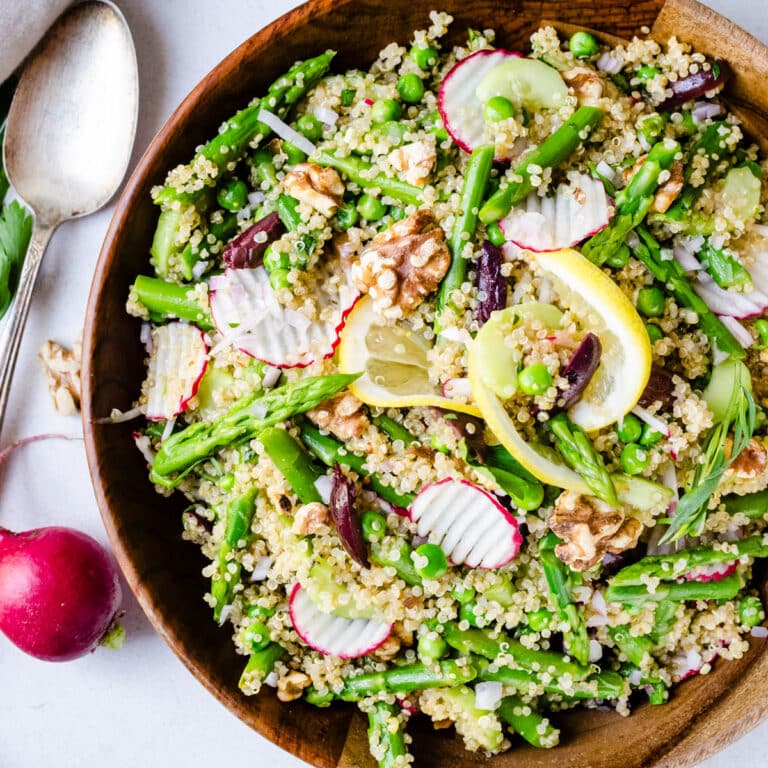 A quinoa salad with asparagus and radishes.