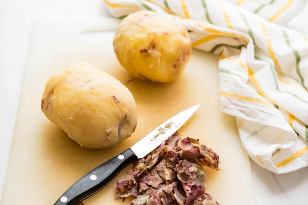 Peel the potatoes.