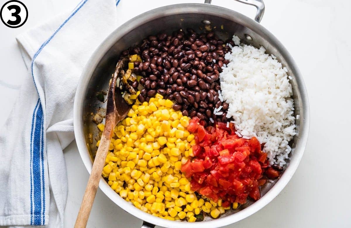 Add the black beans, corn, Ro-Tel tomatoes and cooked rice.