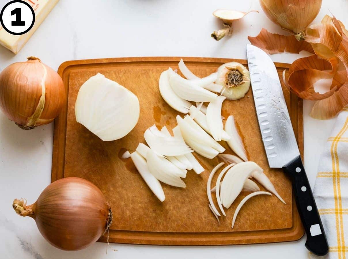 Slicing onions on a cutting board.
