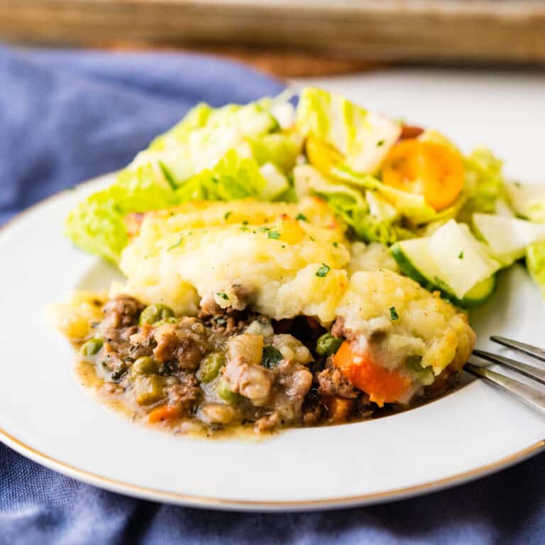 Serving shepherd's pie with a side salad.