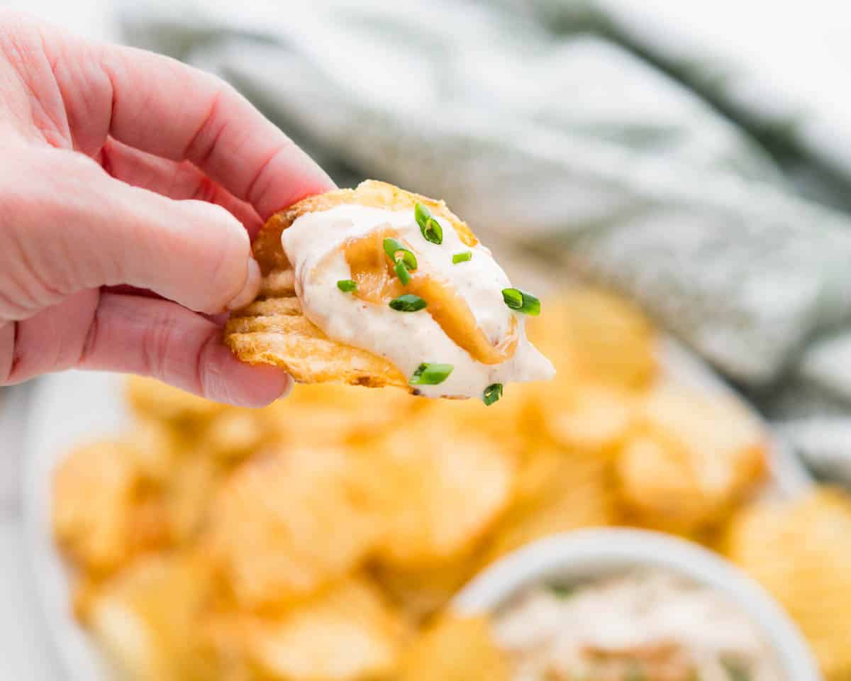 Chips with sour cream and onion dip.