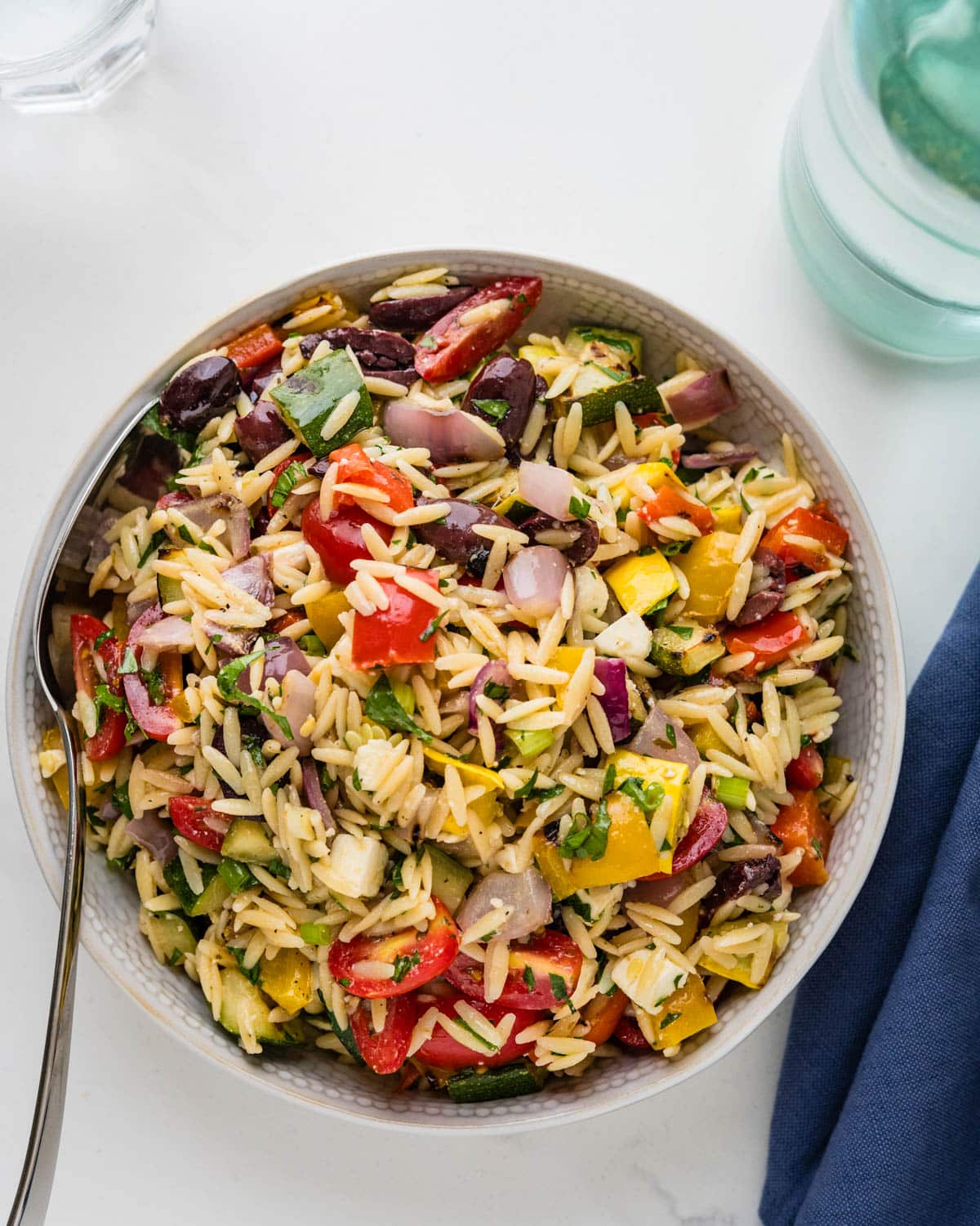 salad with orzo pasta and grilled and fresh vegetables.