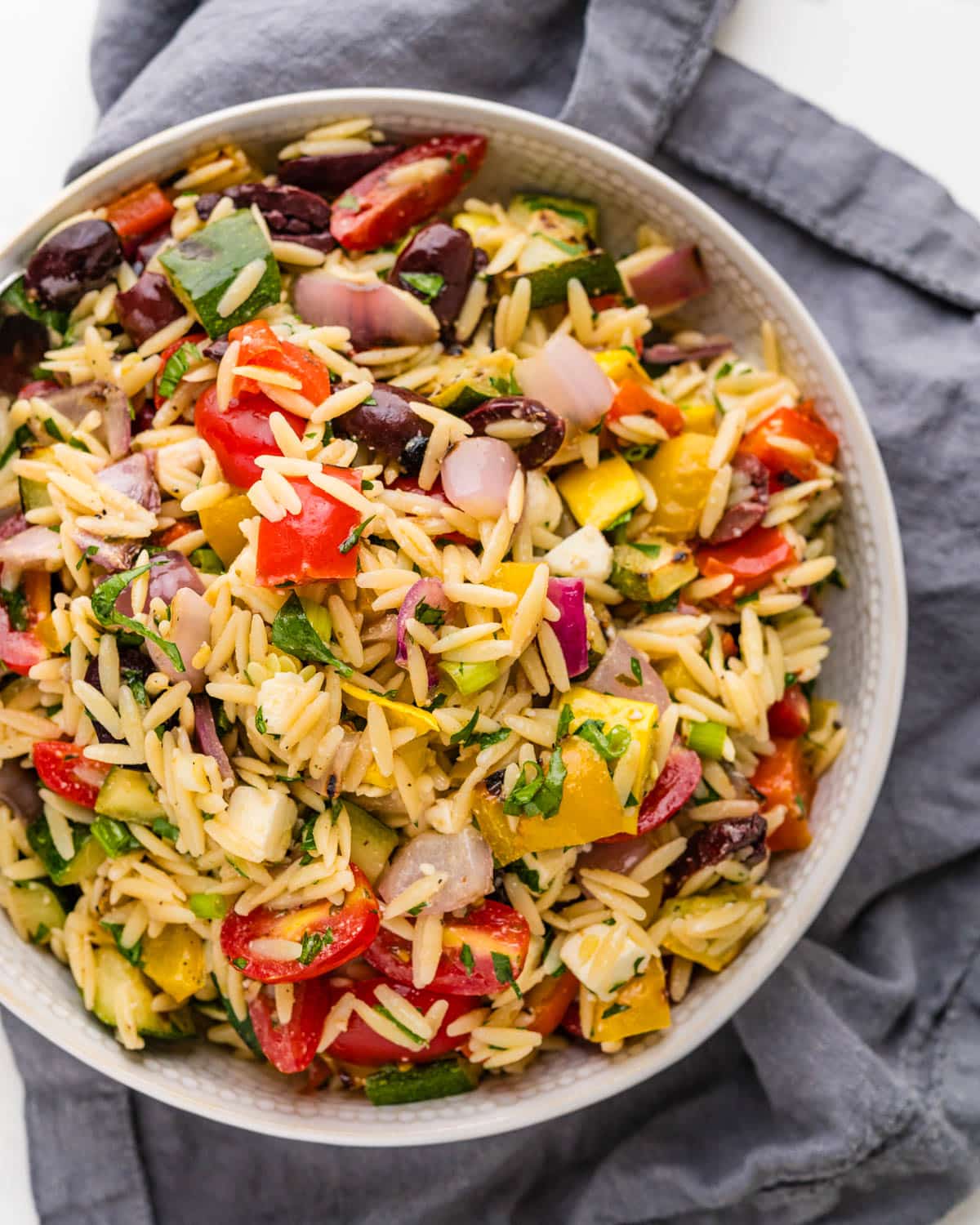 Grilled veggie salad with orzo pasta and feta cheese.