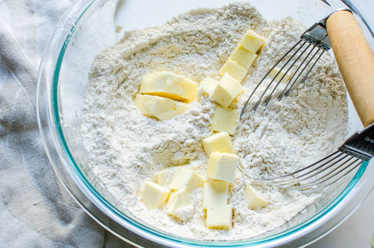 Blending the butter into the flour.