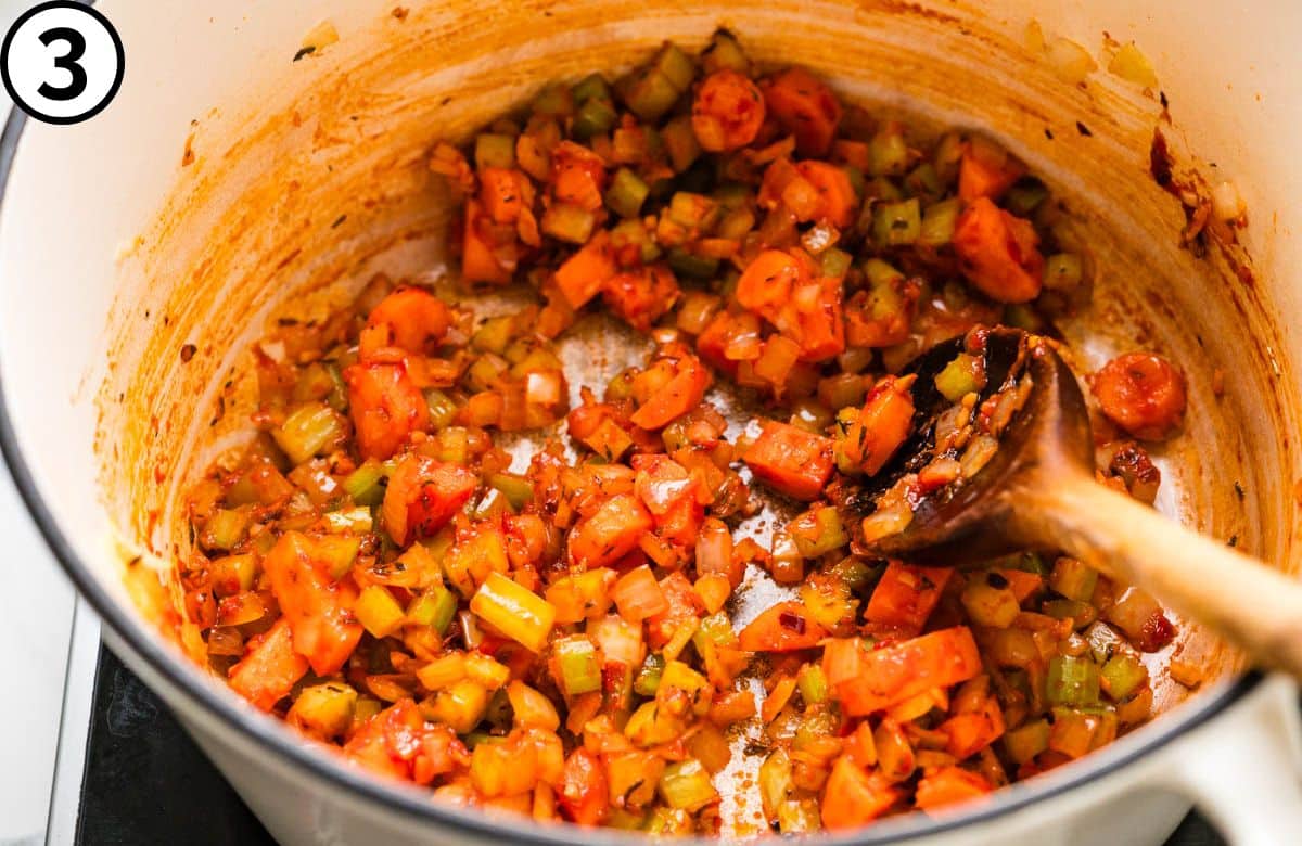 Coat the veg with the tomato paste.