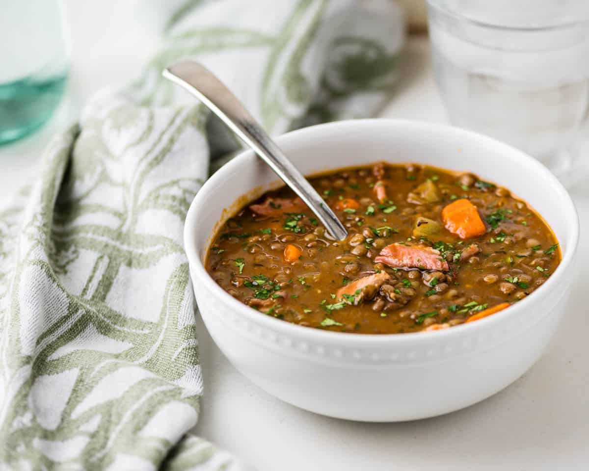 A hot bowl of lentil and ham soup.