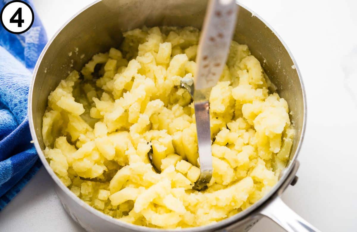 Smash the potatoes with a masher or potato ricer.