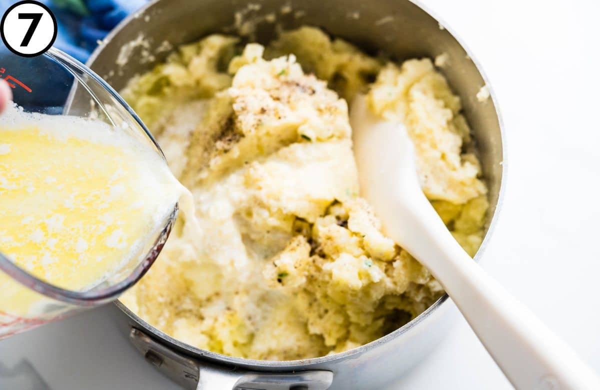 Add the milk and butter a little at a time.