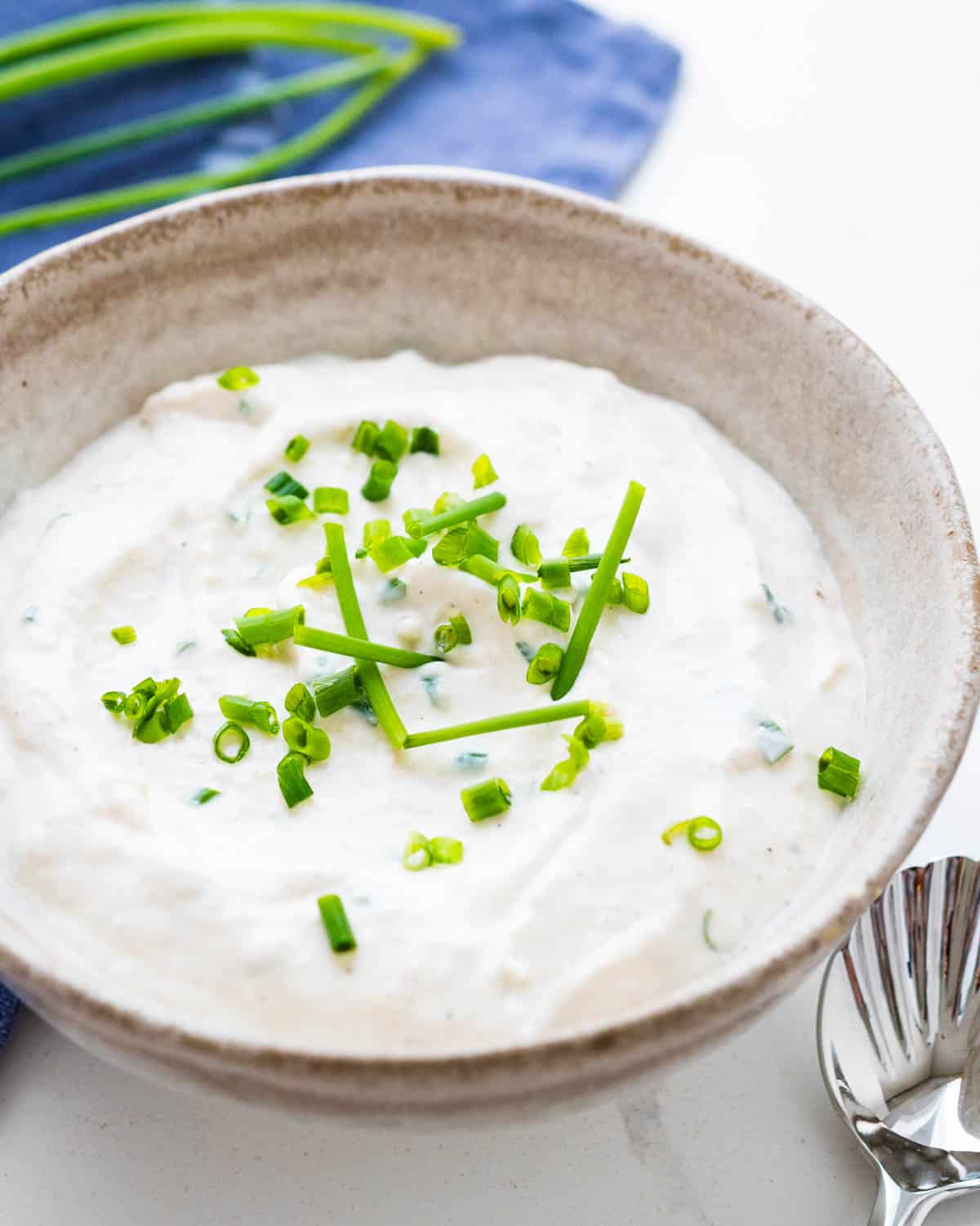 Serving the prime rib horseradish sauce in a bowl.