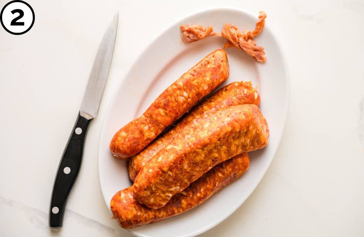 Remove the casings from the sausage.