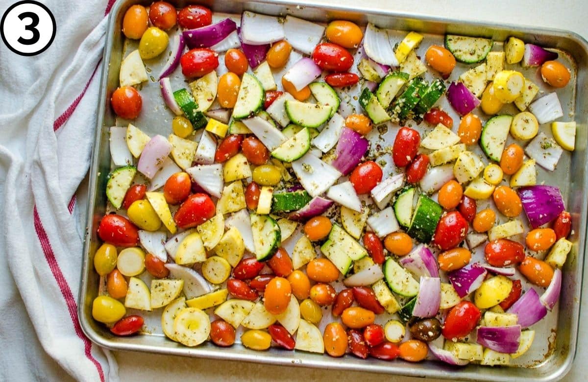 Transferring vegetables to a sheet pan.