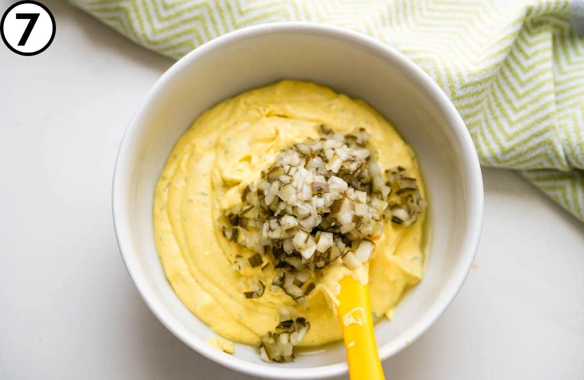 Stir in chopped pickles.