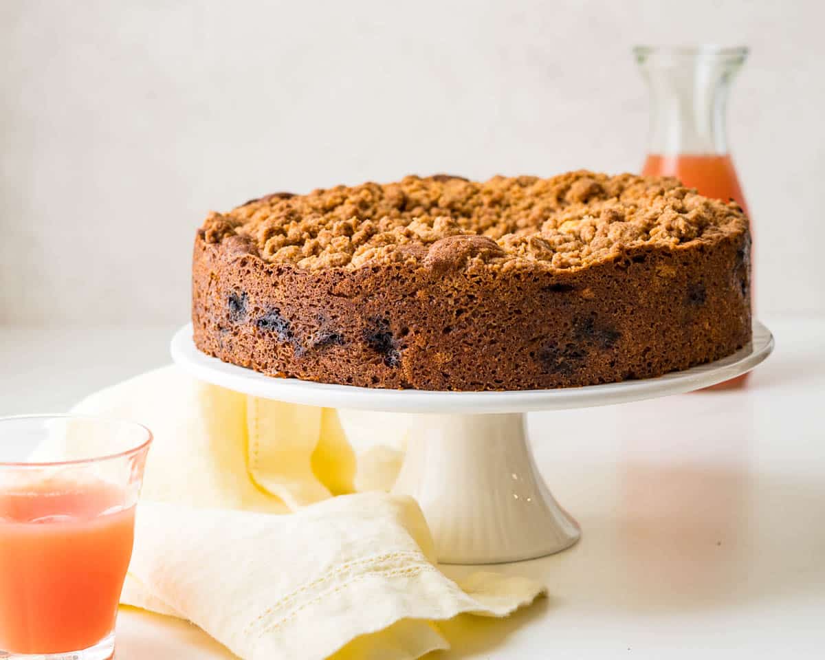 Blueberry Streusel Coffee Cake on a cake stand.
