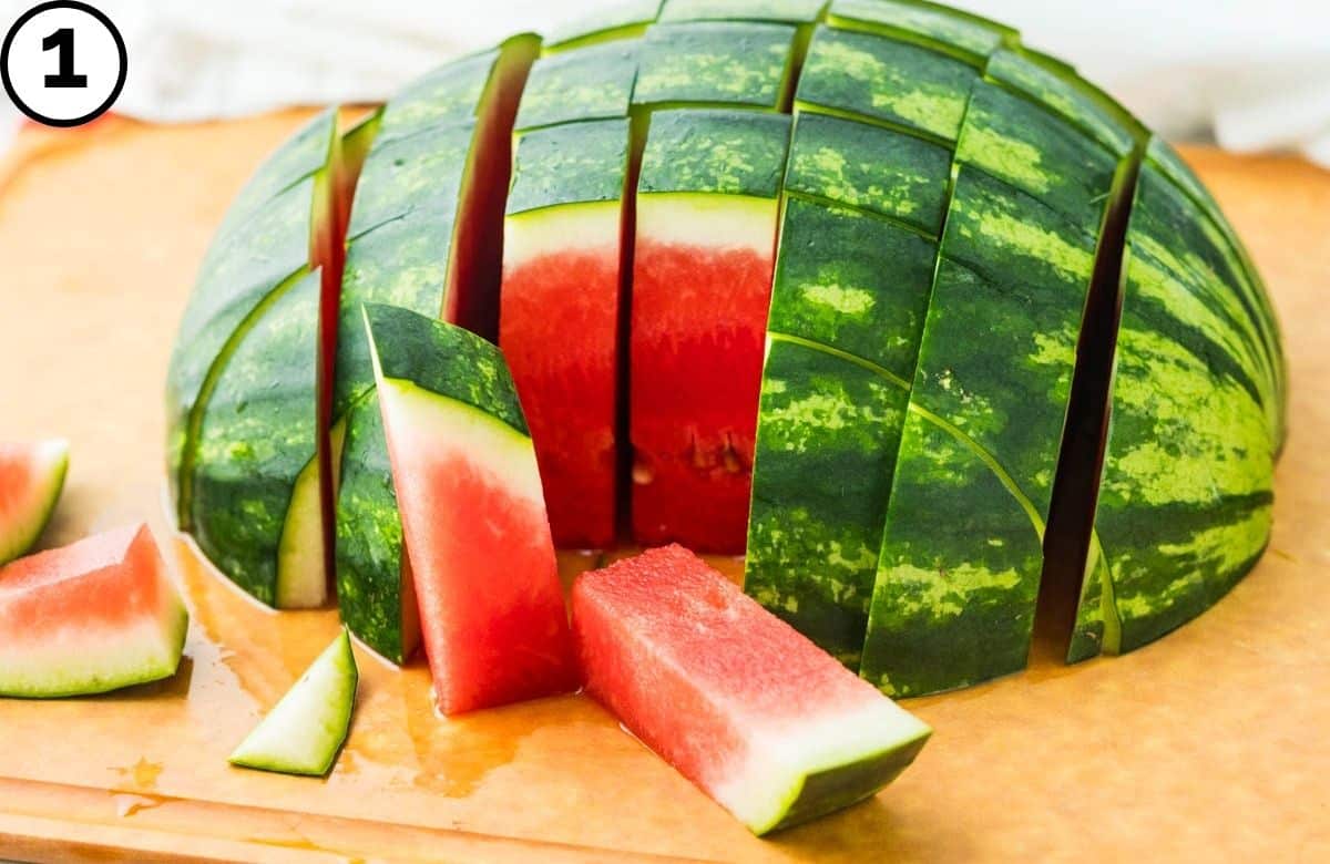 Cutting the watermelon.