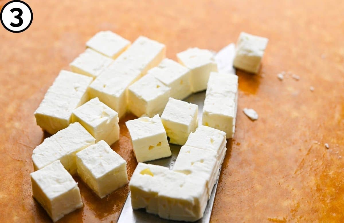 Cube the feta.
