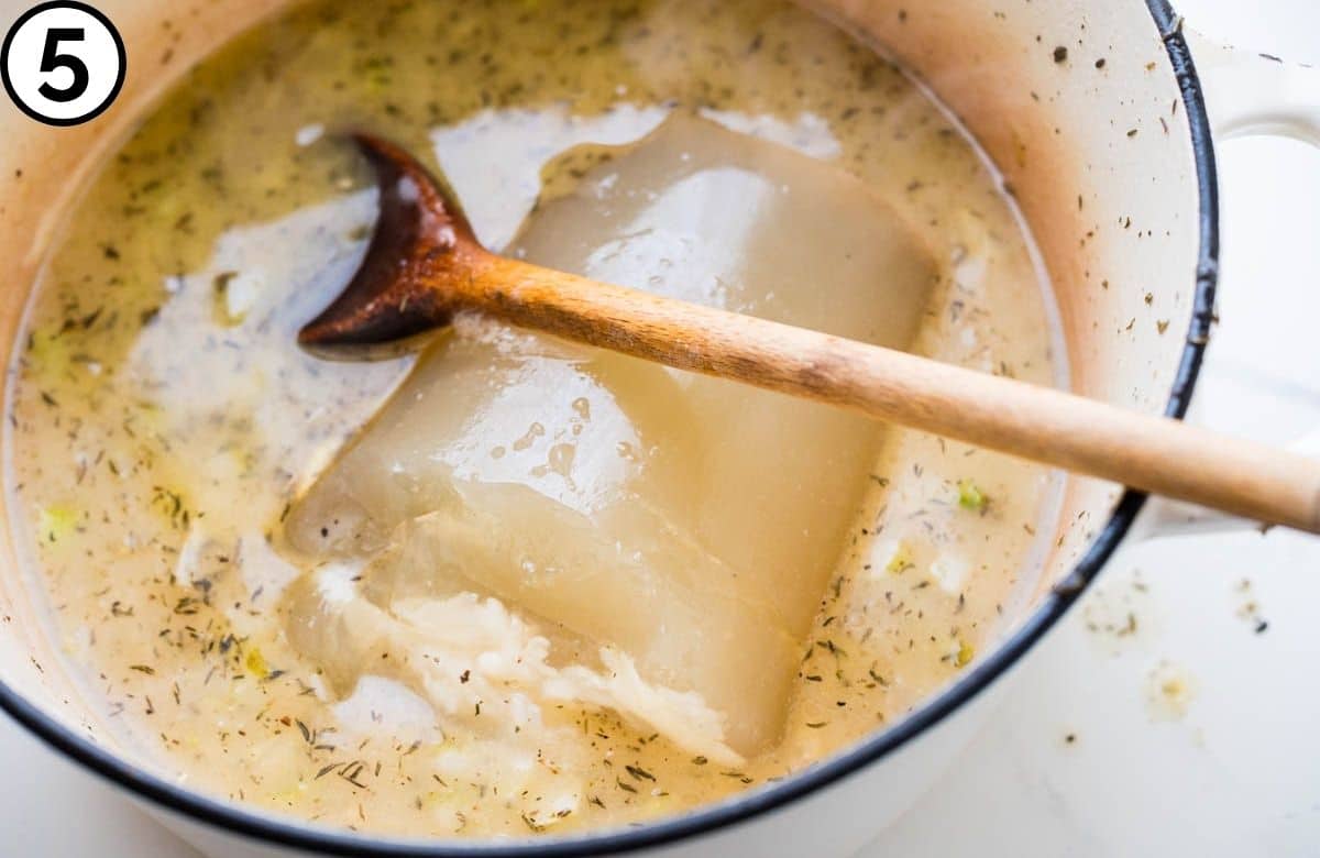 Add the fish stock.