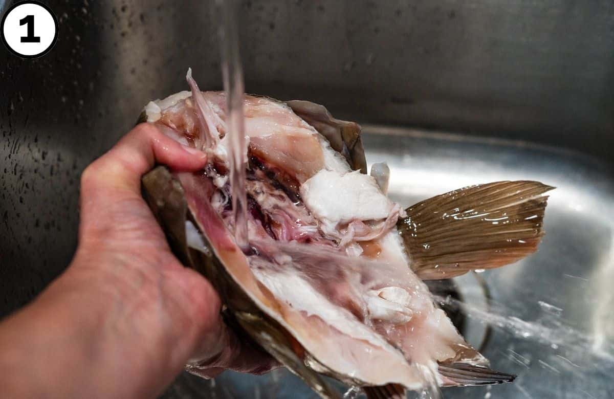 Rinsing fish heads.