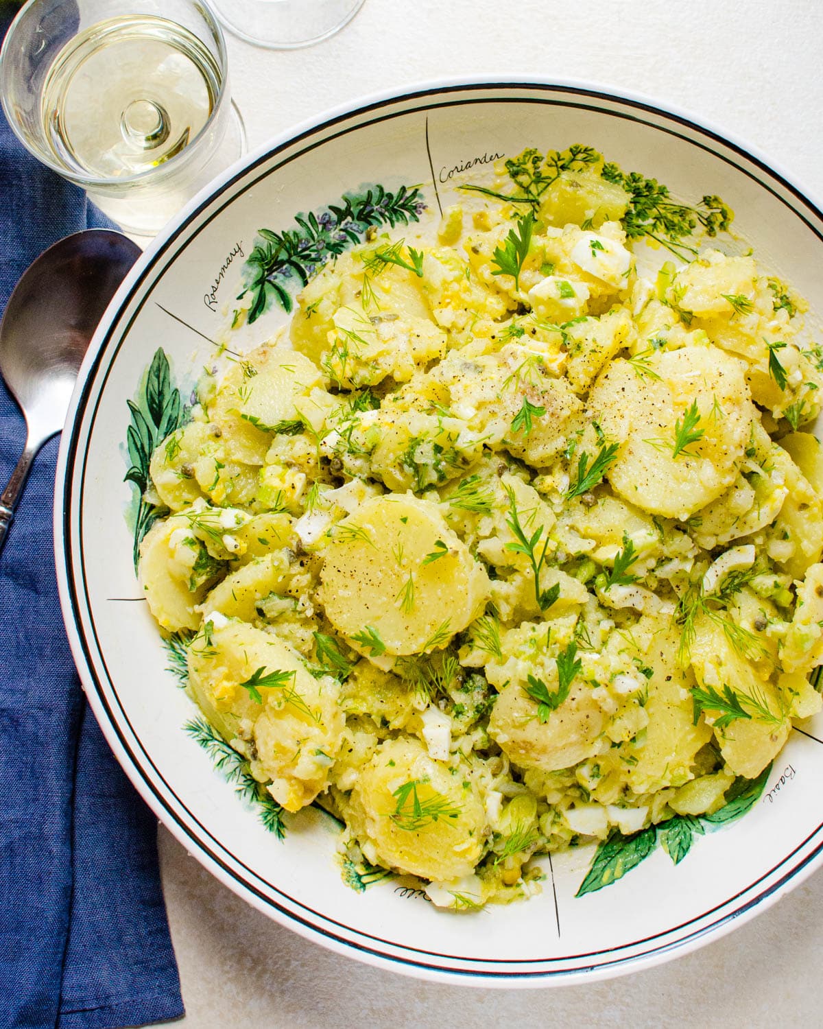 French potato salad with eggs and herbs.