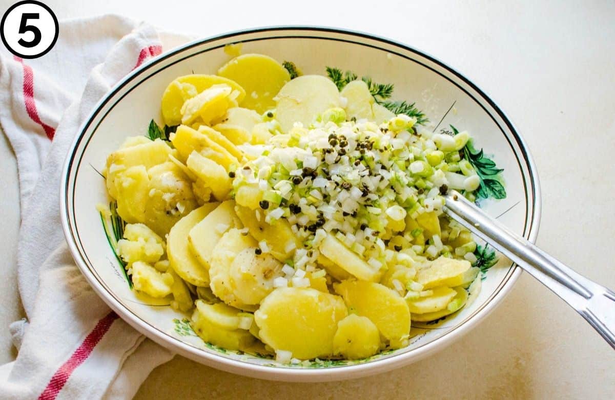 Add the vegetables to the potatoes.