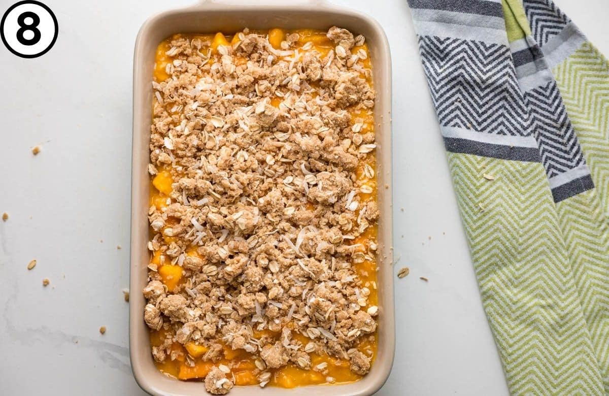 Sprinkle the crumble over the fruit.
