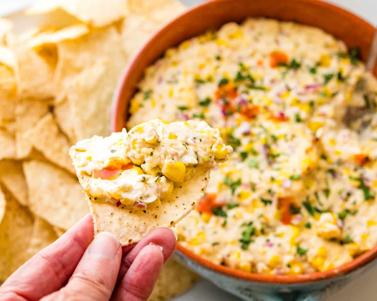 Spooning up more corn dip.
