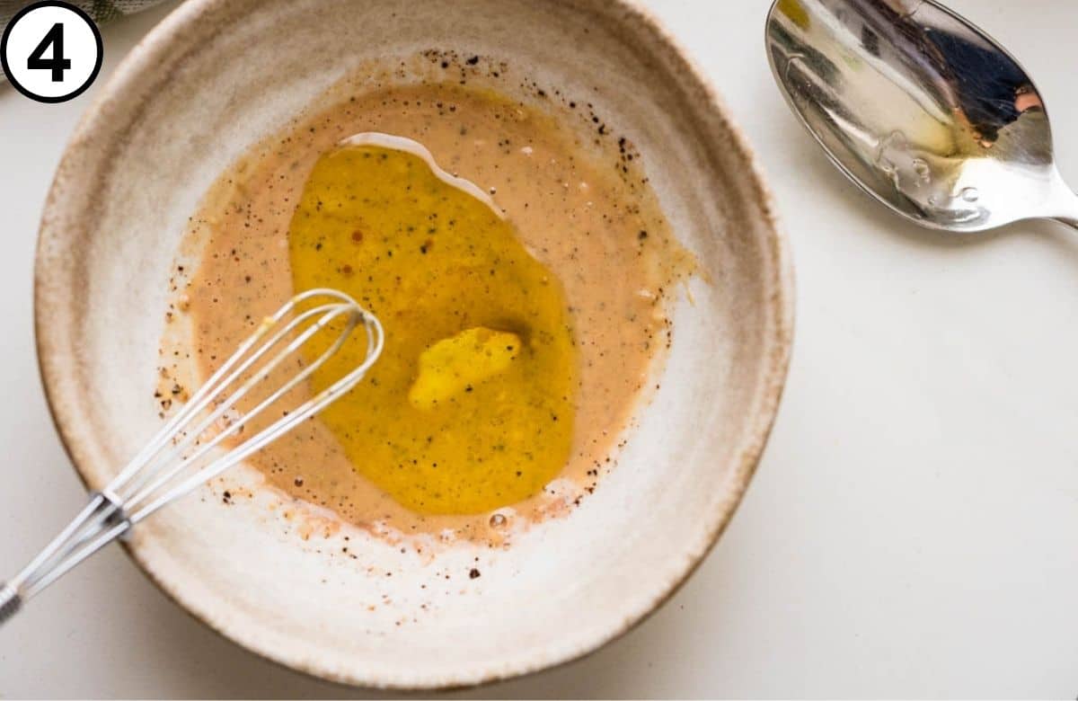 Adding olive oil.
