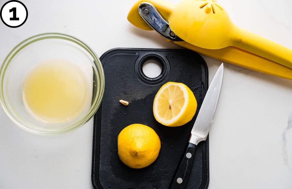 Squeezing lemons for juice.